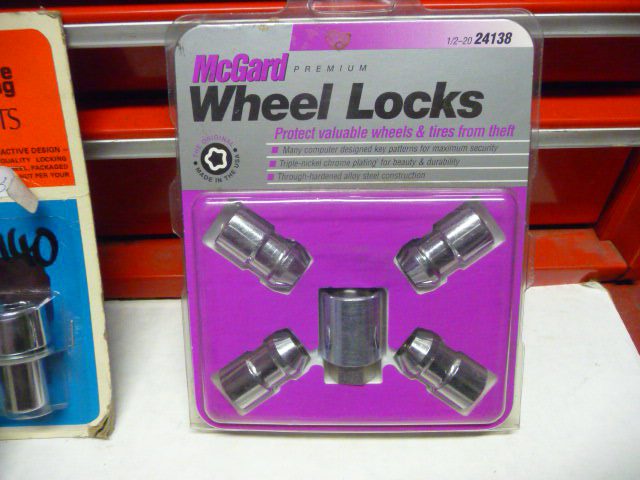 Variety of triple plate chrome wheel locks and key for acorn and mag seat wheels